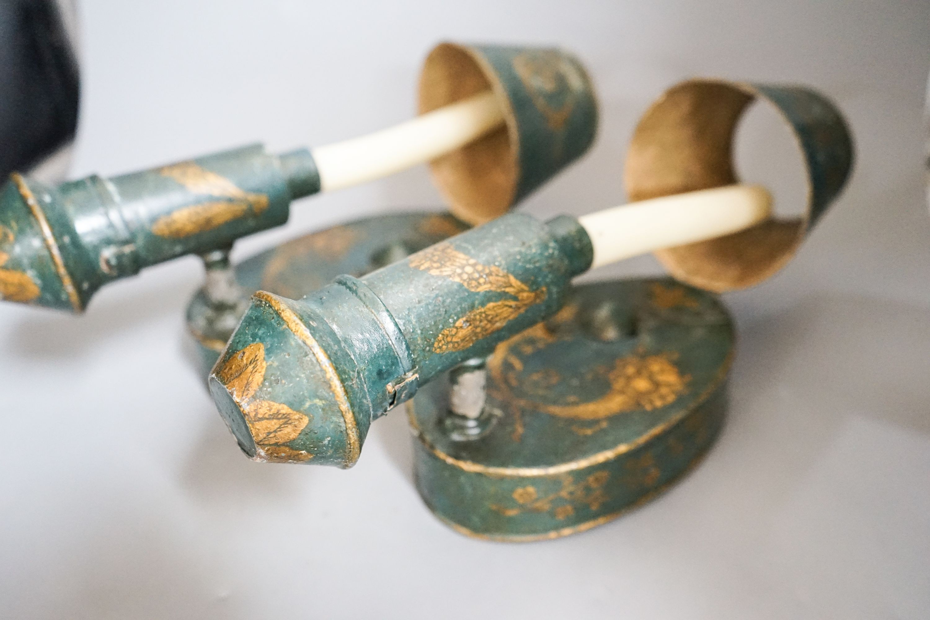 A pair of 19th century toleware wall lights 32cm